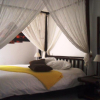 Chambre Marie Galante Ambiance Safari avec sa grande terrasse pour des pauses Bien-être inoubliables !
